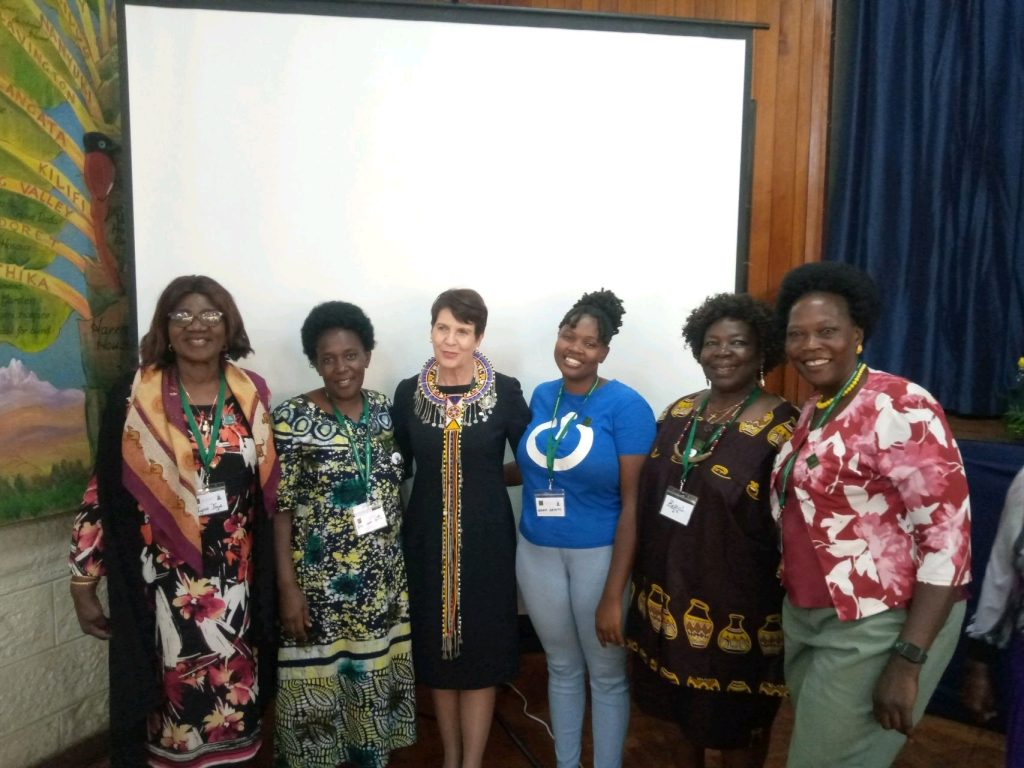 Women Grow Uganda members gathered at a district conference
